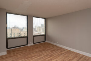 Unit Living Room, 2 Large Windows, Wood Floors, Unfurnished.