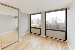 Unit Bedroom, Mirrored sliding closet doors, 2 Large Windows in Bedroom, Unfurnished, Wood Floors